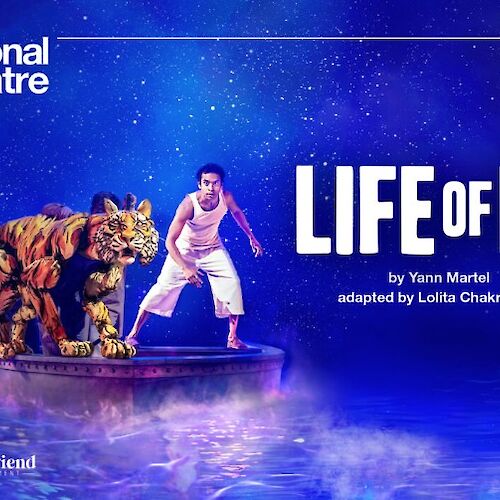 Life of Pi live: a tiger on a small boat with a man against a starry blue backdrop, presented by National Theatre Live.